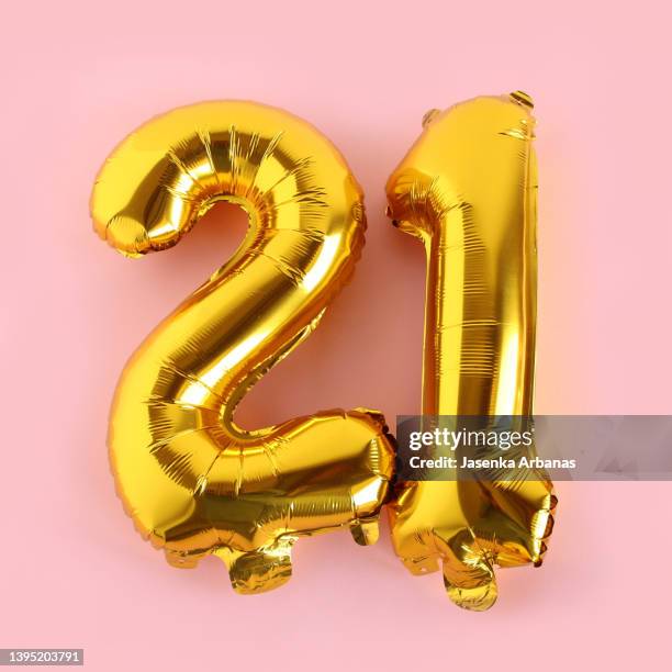 gold balloon number 21 - birthday balloons stock pictures, royalty-free photos & images