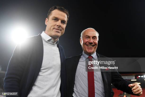 Scott Parker and Jeff Mostyn, Chairperson of AFC Bournemouth celebrate after their sides victory and promotion to the Premier League during the Sky...