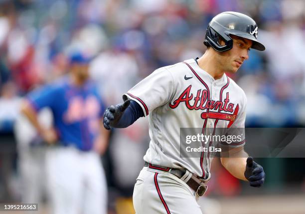 Matt Olson of the Atlanta Braves celebrates his three run home run in the fifth inning off a pitch from David Peterson of the New York Mets at Citi...