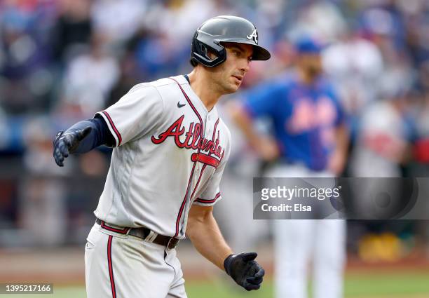 Matt Olson of the Atlanta Braves celebrates his three run home run in the fifth inning off a pitch from David Peterson of the New York Mets at Citi...