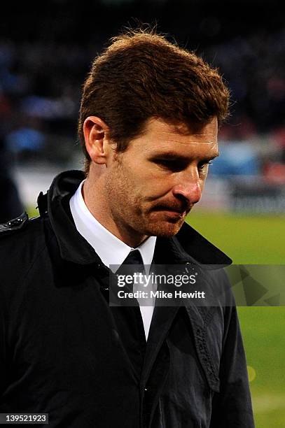 Dejected Andre Villas-Boas the Chelsea manager walks off the pitch following his team's 3-1 defeat during the UEFA Champions League round of 16 first...