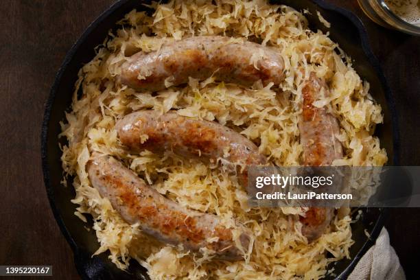 german bratwurst and sauerkraut - pork sausage stock pictures, royalty-free photos & images