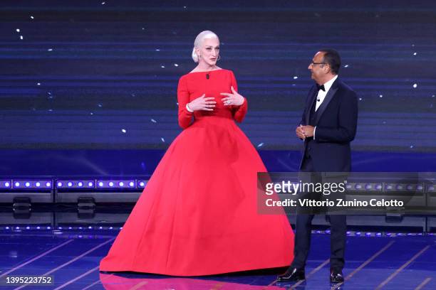Drusilla Foer and Carlo Conti are seen on stage during the 67th David Di Donatello show on May 03, 2022 in Rome, Italy.
