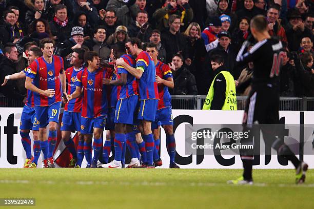 Valentin Stocker of Basel celebrates his team's first goal with team mates during the UEFA Champions League Round of 16 first leg match between FC...