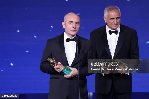 Bruno Oliviero and Leonardo Di Costanzo with David di Donatello for Best Screenplay are seen on stage during the 67th David Di Donatello show on May...