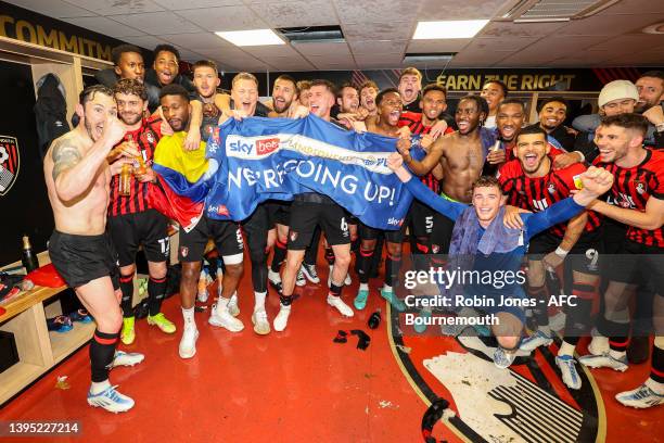 Bournemouth players celebrate automatic promotion to the Premier League after their sides 1-0 win during the Sky Bet Championship match between AFC...