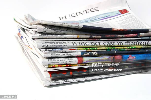 a mid size stack of arvada newspapers - ad magazine stockfoto's en -beelden