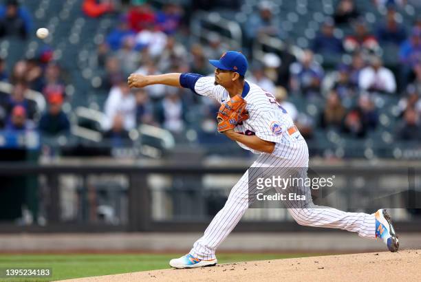 Carlos Carrasco of the New York Mets delivers a pitch in the first inning against the Atlanta Braves during game two of a double header at Citi Field...
