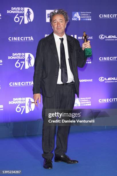 Director Paolo Sorrentino poses with David di Donatello for Best Movie during the 67th David Di Donatello winners photocall on May 03, 2022 in Rome,...