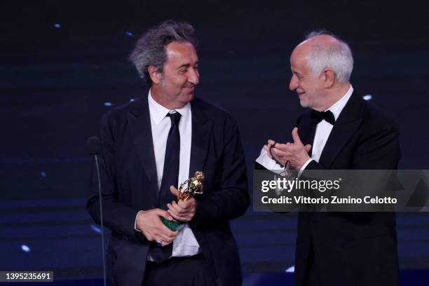 Director Paolo Sorrentino with David di Donatello for Best Movie and Tony Servillo are seen on stage during the 67th David Di Donatello show on May...