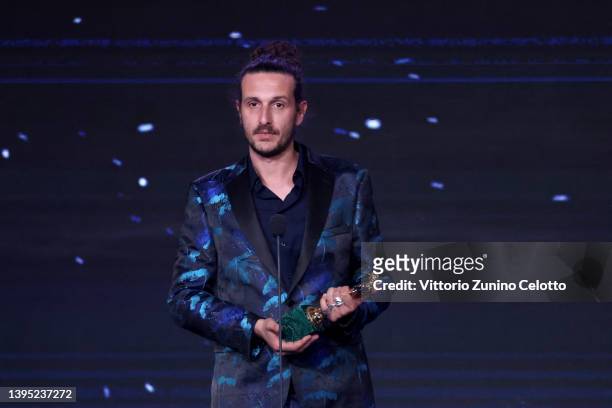 Davide De Luca with David di Donatello for Best make-up artist is seen on stage during the 67th David Di Donatello show on May 03, 2022 in Rome,...