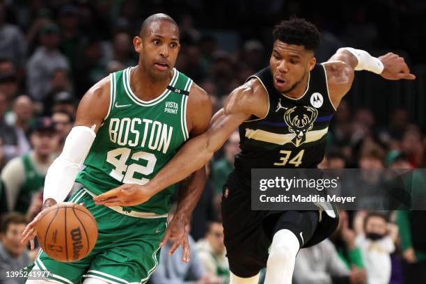 Giannis Antetokounmpo of the Milwaukee Bucks steals the ball from Al Horford of the Boston Celtics during the second quarter of Game Two of the...