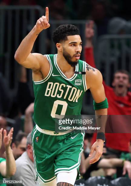 Jayson Tatum of the Boston Celtics celebrates after scoring against the Milwaukee Bucks during the third quarter of Game Two of the Eastern...