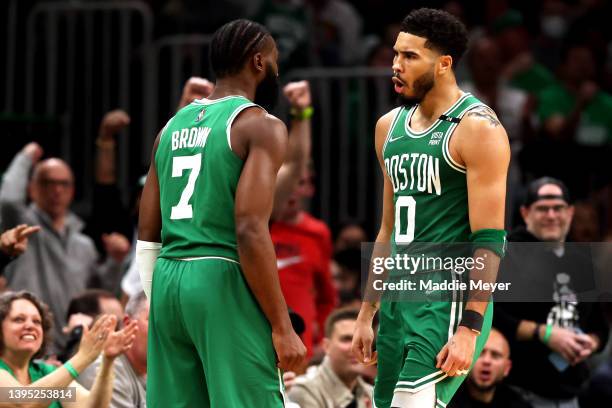 Jayson Tatum of the Boston Celtics and Jaylen Brown celebrate during the third quarter of Game Two of the Eastern Conference Semifinals against the...