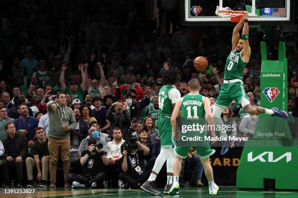 Jayson Tatum of the Boston Celtics dunks against the Milwaukee Bucks during the third quarter of Game Two of the Eastern Conference Semifinals at TD...