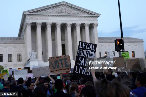 Pro-choice activists protest during a rally in front of the U.S. Supreme Court in response to the leaked Supreme Court draft decision to overturn Roe...