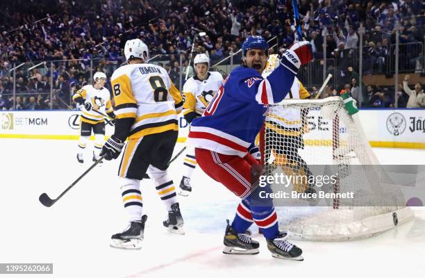 Chris Kreider of the New York Rangers celebrates a first period goal by Adam Fox against the Pittsburgh Penguins in Game One of the First Round of...