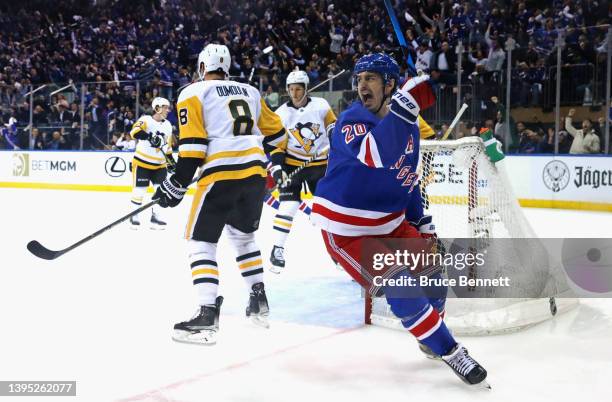 Chris Kreider of the New York Rangers celebrates a first period goal by Adam Fox against the Pittsburgh Penguins in Game One of the First Round of...