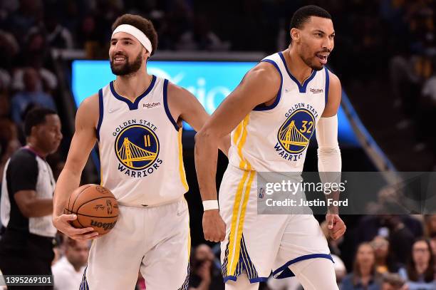 Klay Thompson of the Golden State Warriors and Otto Porter Jr. #32 of the Golden State Warriors react against the Memphis Grizzlies during Game Two...