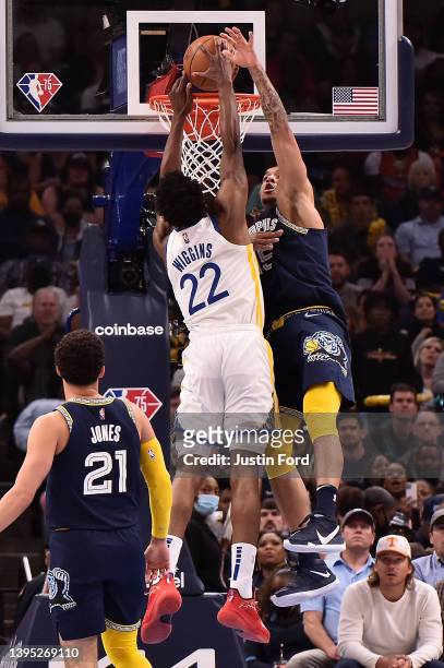 Andrew Wiggins of the Golden State Warriors dunks against Brandon Clarke of the Memphis Grizzlies during Game Two of the Western Conference...