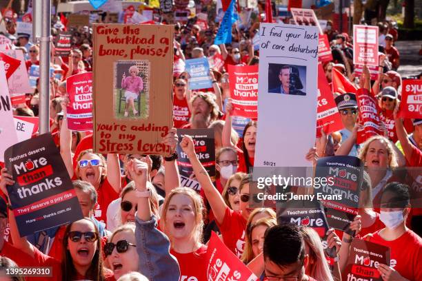 School teachers march along Macquarie St towards NSW Parliament on May 04, 2022 in Sydney, Australia. Tens of thousands of teachers across New South...