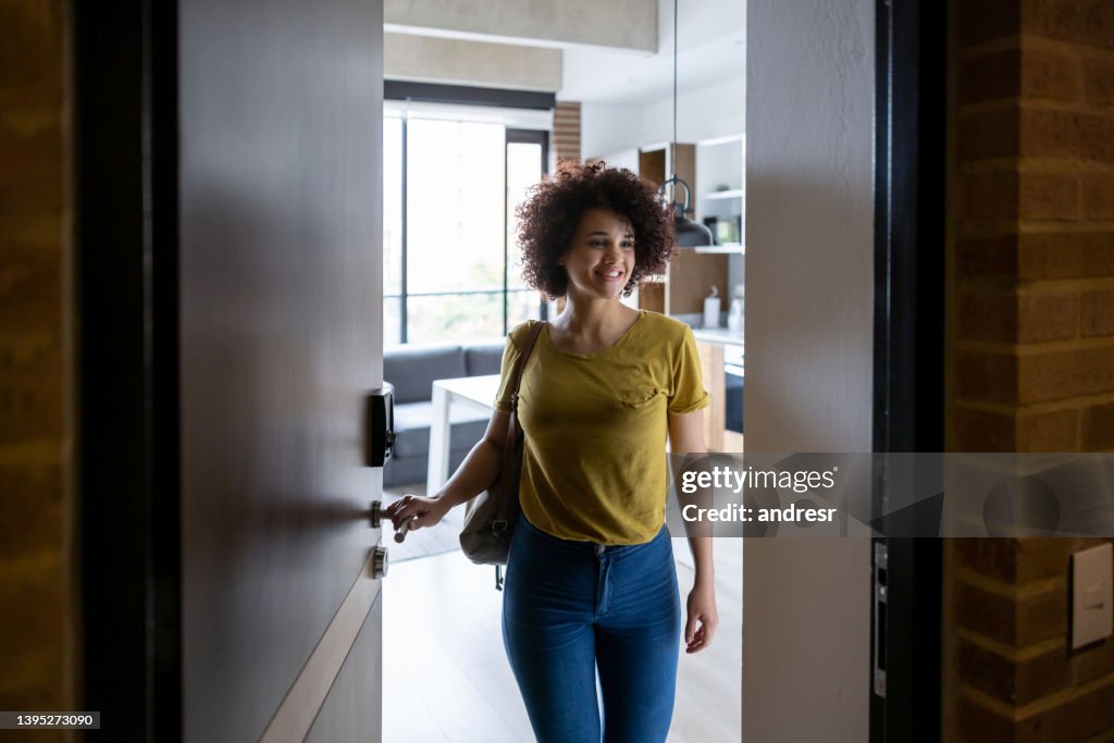 Woman at the door leaving her house
