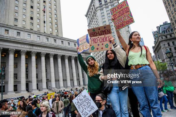 People attend a protest in Manhattan to show support for abortion rights in the United States on May 3, 2022 in New York City. A leaked draft opinion...