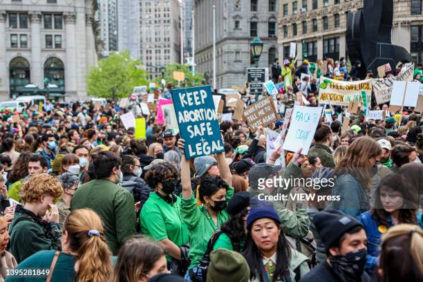 People attend a protest in Manhattan to show support for abortion rights in the United States on May 3, 2022 in New York City. A leaked draft opinion...