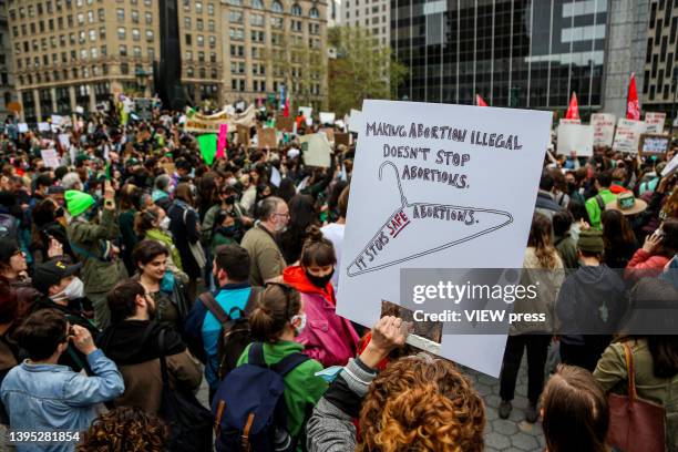 People attend a protest in Manhattan to show support for abortion rights in the United States on May 3, 2022 in New York City. A leaked draft opinion...