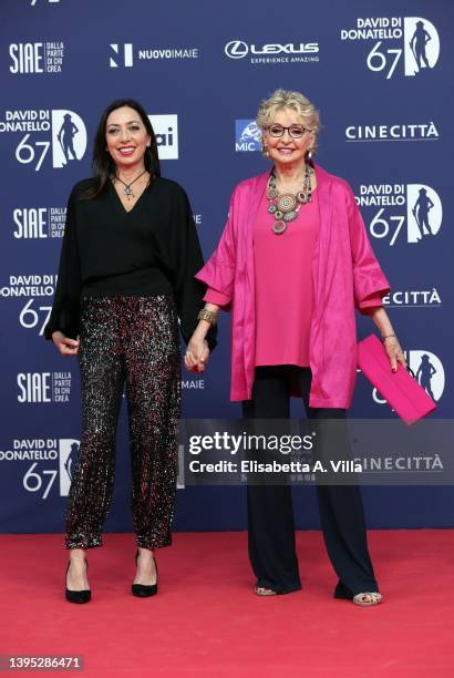 Verdiana Pettinari and Enrica Bonaccorti attend the 67th David Di Donatello red carpet at Cinecitta Studios on May 03, 2022 in Rome, Italy.