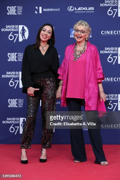 Verdiana Pettinari and Enrica Bonaccorti attend the 67th David Di Donatello red carpet at Cinecitta Studios on May 03, 2022 in Rome, Italy.