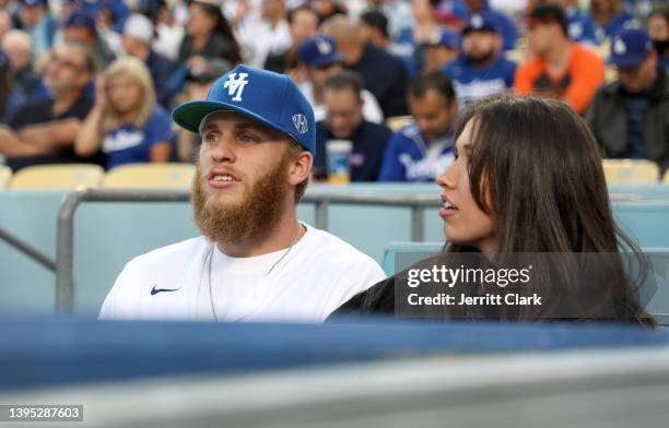 Player Cooper Kupp and Anna Croskrey attend the game between the Los Angeles Dodgers and the San Francisco Giants at Dodger Stadium on May 03, 2022...