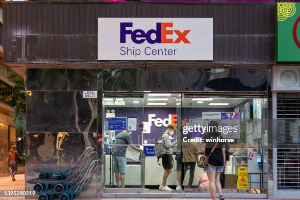 fedex ship center in hong kong - fed ex stock pictures, royalty-free photos & images