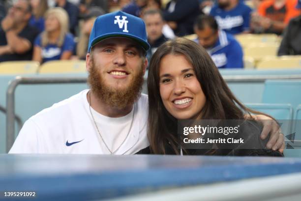 Player Cooper Kupp and Anna Croskrey attend the game between the Los Angeles Dodgers and the San Francisco Giants at Dodger Stadium on May 03, 2022...