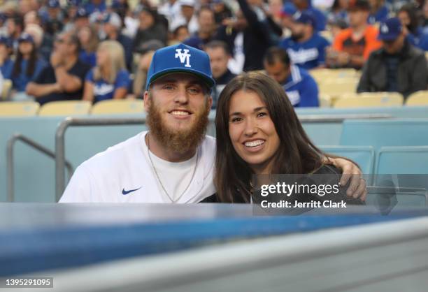 Player Cooper Kupp and Anna Croskrey attend the game between the Los Angeles Dodgers and the San Francisco Giants at Dodger Stadium on May 03, 2022...