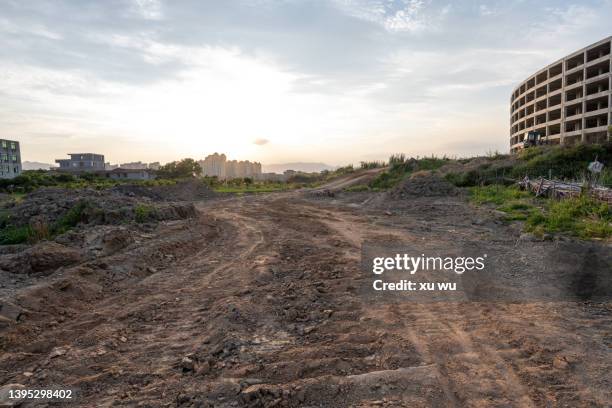 empty dirt tracks. construction vehicle advertising background - mud stock pictures, royalty-free photos & images