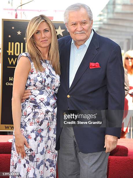 Jennifer Aniston and John Aniston attends the Jennifer Aniston Hollywood Walk Of Fame Induction Ceremony on February 22, 2012 in Hollywood,...