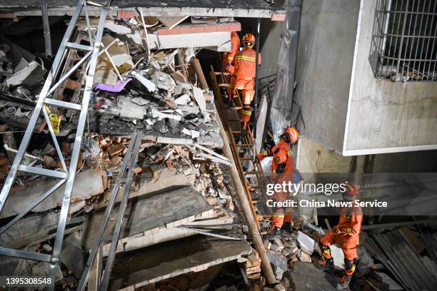 Rescuers search for survivors at the collapse site of a self-constructed residential building on May 2, 2022 in Changsha, Hunan Province of China....