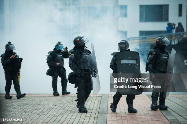 Colombia's riot police clash with demonstrators during the 28 of April commemorative demonstrations against the government of president Ivan Duque...