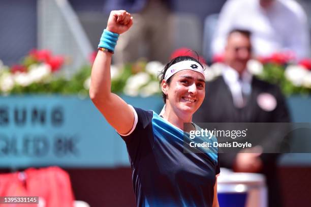 Ons Jabeur of Tunisia celebrates victory in their quarter final match against Simona Halep of Romania on day seven of Mutua Madrid Open at La Caja...