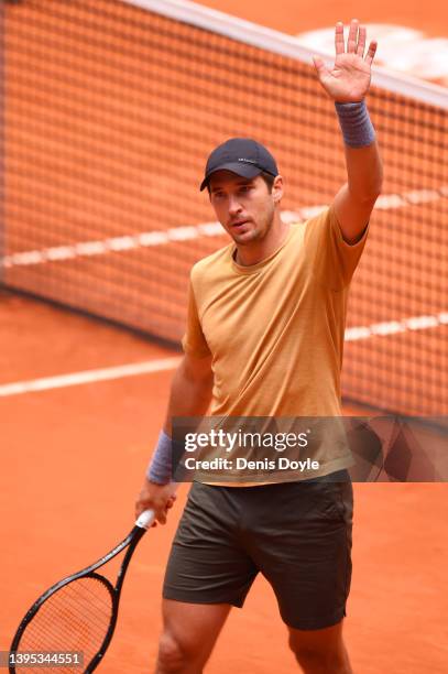 Dusan Lajovic of Serbia celebrates victory in their third round match against Casper Ruud of Norwayon day seven of Mutua Madrid Open at La Caja...