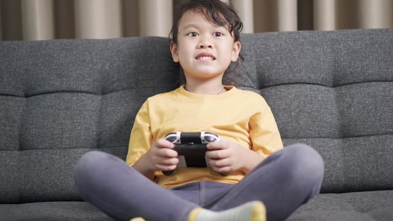 Kid Using Controller 609 Kid Holding Video Game Controller Stock Videos, Footage, & 4K Video ...