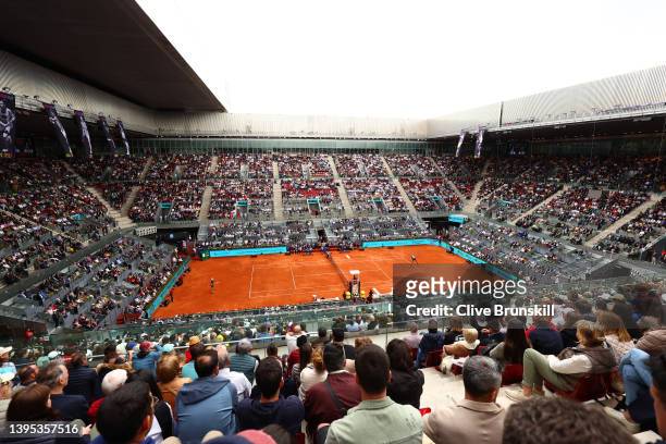 General view as Rafael Nadal of Spain serves in their second round match against Miomir Kecmanovic of Serbia on day seven of Mutua Madrid Open at La...