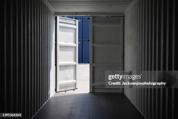 abstract empty in side container with white light outside. - open shipping container stock pictures, royalty-free photos & images