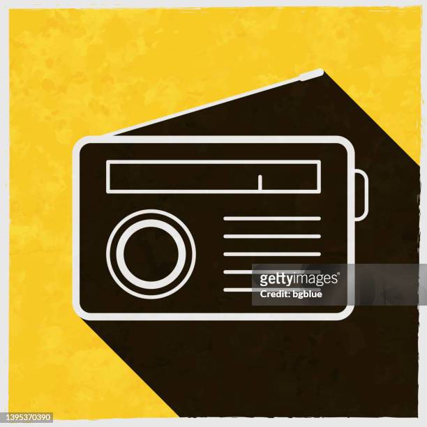 stockillustraties, clipart, cartoons en iconen met radio. icon with long shadow on textured yellow background - tuner