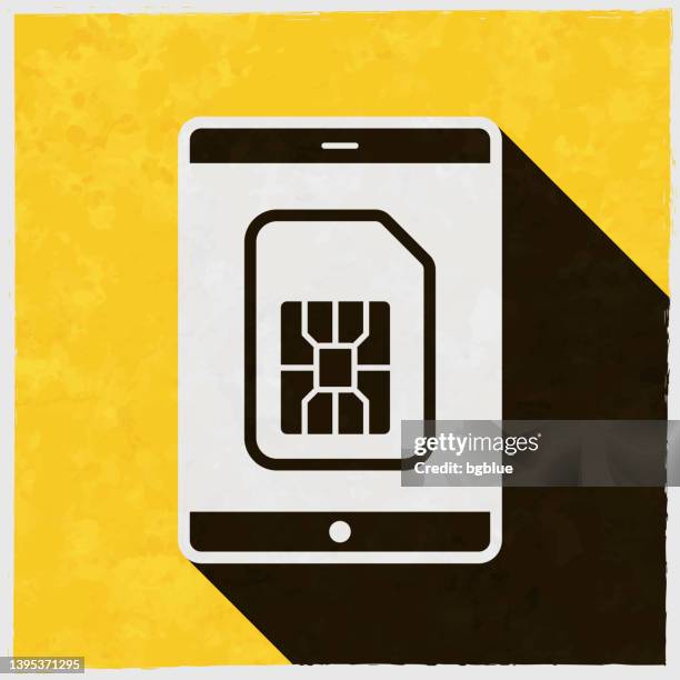 tablet pc with sim card. icon with long shadow on textured yellow background - using tablet close up stock illustrations