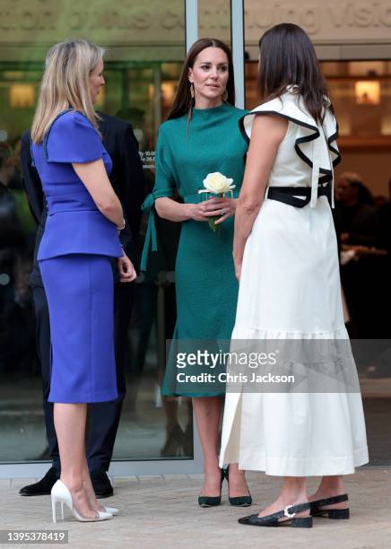 Catherine, Duchess of Cambridge speaks with Stephanie Phair, British Fashion Council Chairman, Chief Executive of the Design Museum Tim Marlow and...
