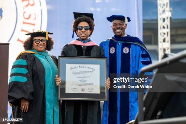 Chris "Ludacris" Bridges receives honorary degree during the 2022 Georgia State University Commencement Ceremony at Center Parc Credit Union Stadium...