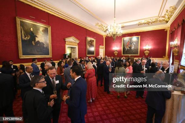 Guests are seen at The National Pharmacy Association Reception at St James's Palace on May 04, 2022 in London, England. The Prince of Wales hosted a...