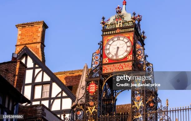 close up, sunrise glow, eastgate clock, chester, cheshire, england - chester stock-fotos und bilder